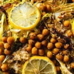 Roasted shredded hispi cabbage with charred lemon salad on a plate