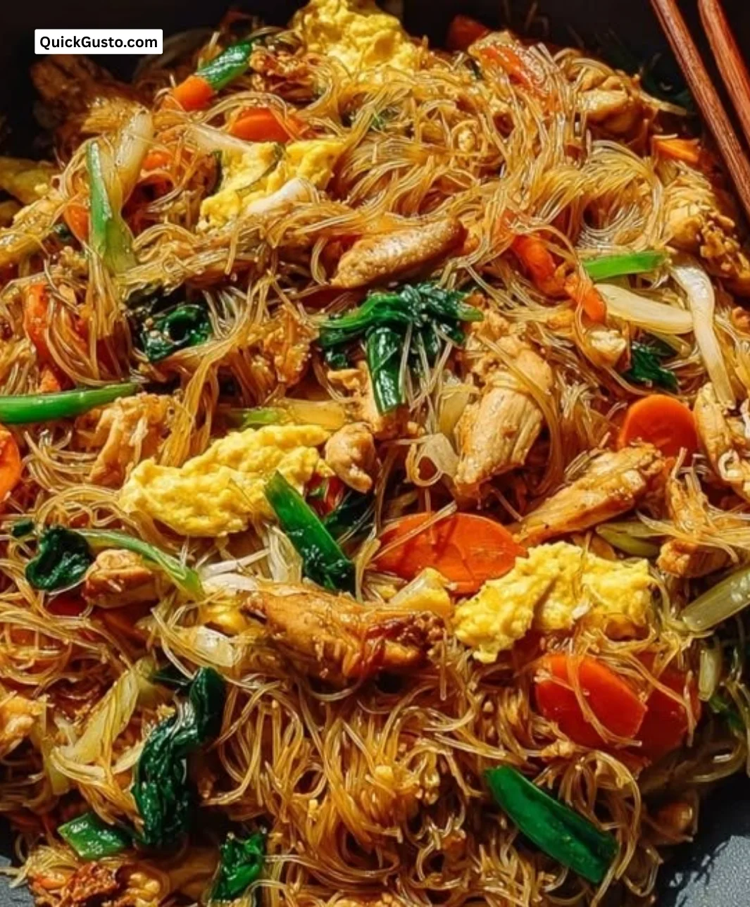 Delicious Chicken Mei Fun stir-fried noodles with vegetables and chicken
