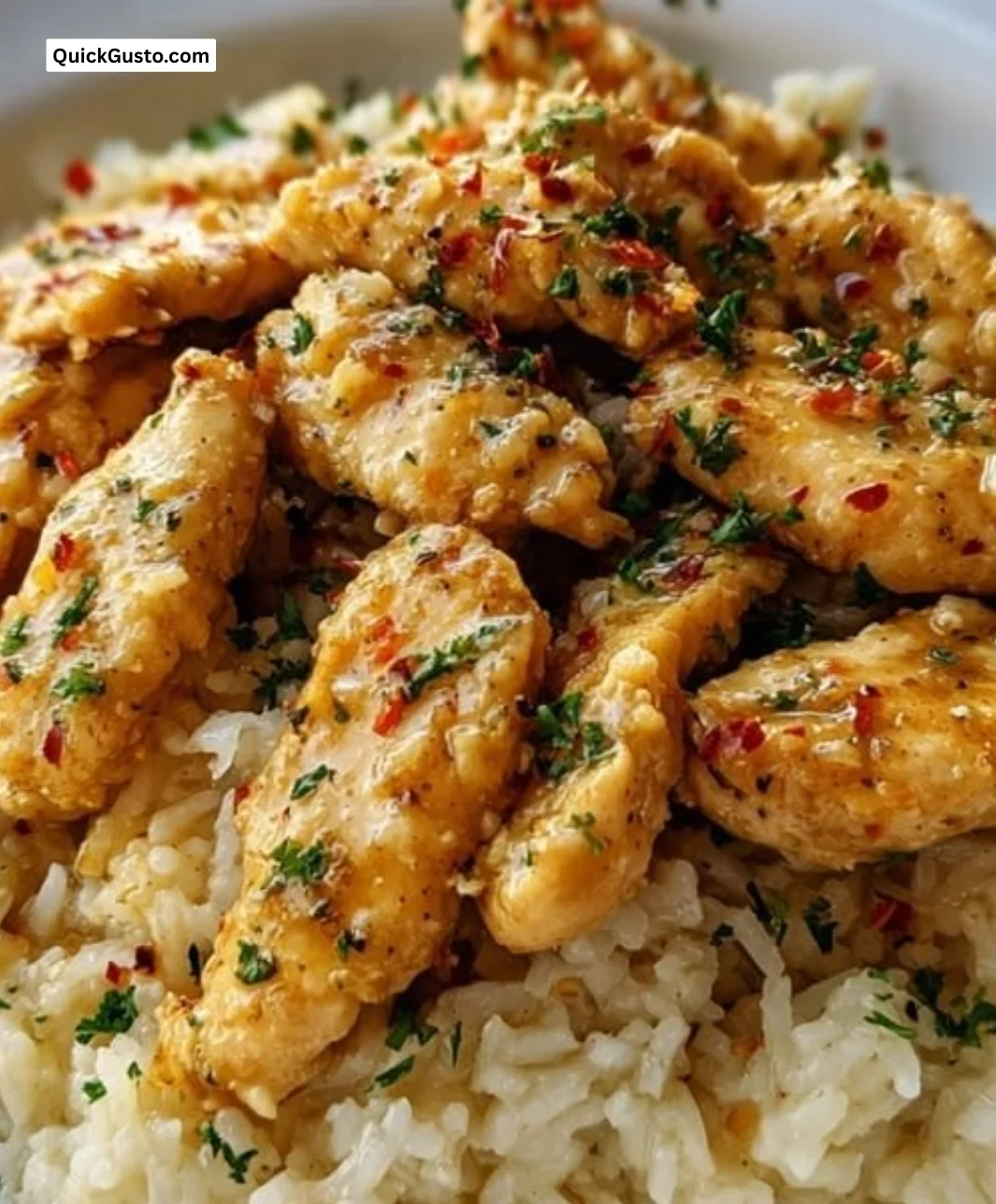 Delicious Chicken Scampi served with Garlic Parmesan Rice on a plate