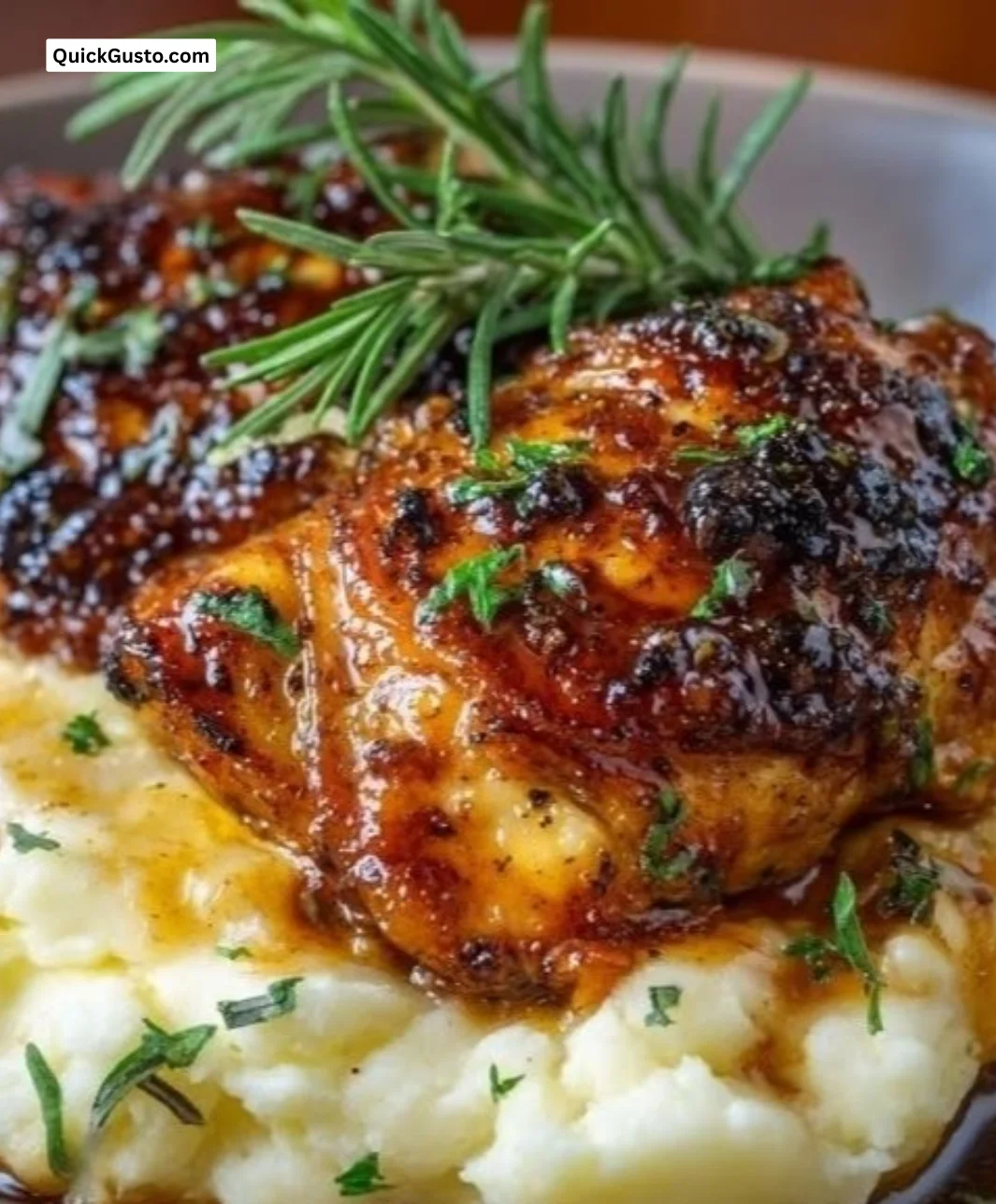Chipotle Honey Chicken thighs served with smoked Gouda mashed potatoes