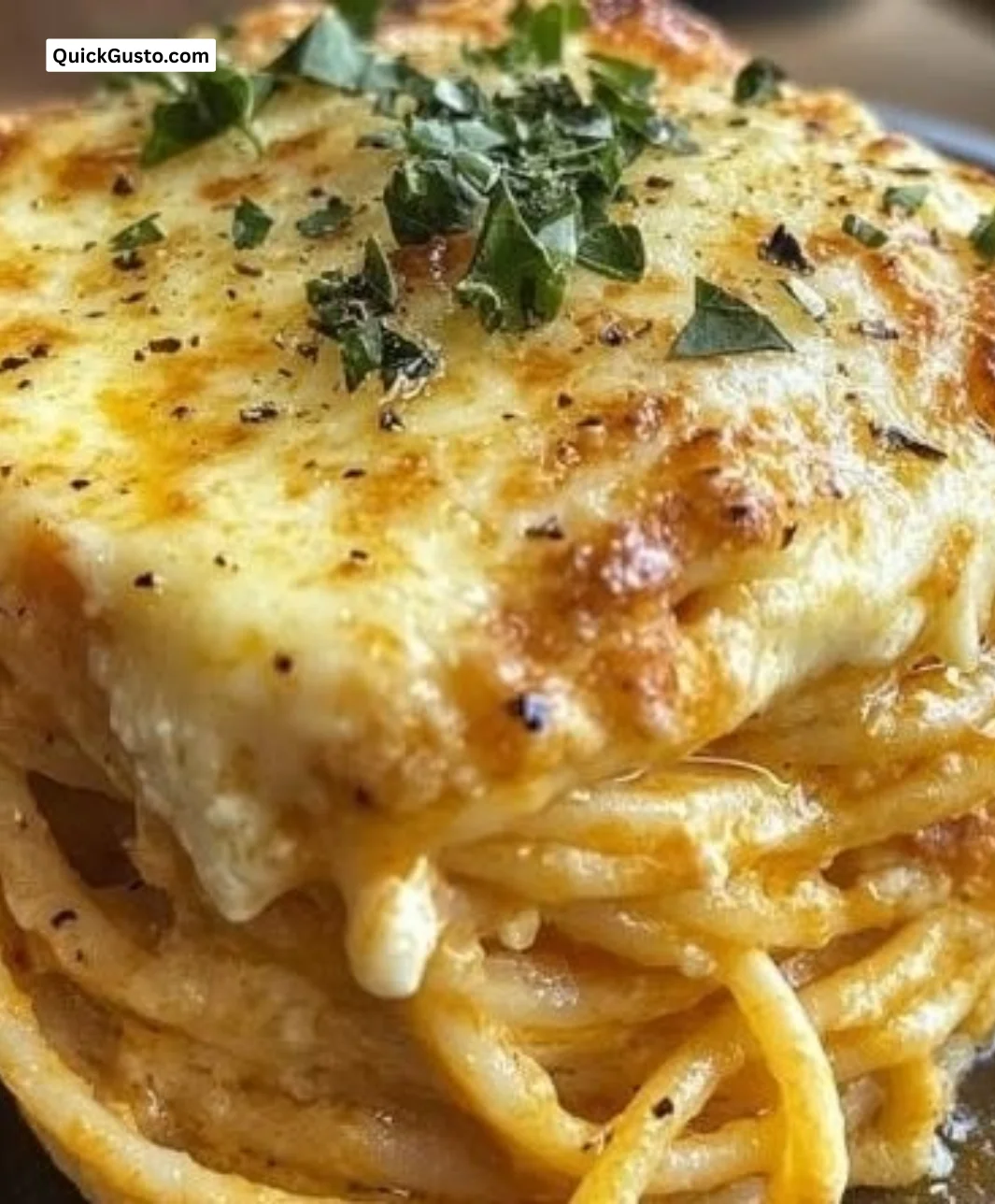 Delicious Cream Cheese Baked Spaghetti Casserole served in a baking dish.