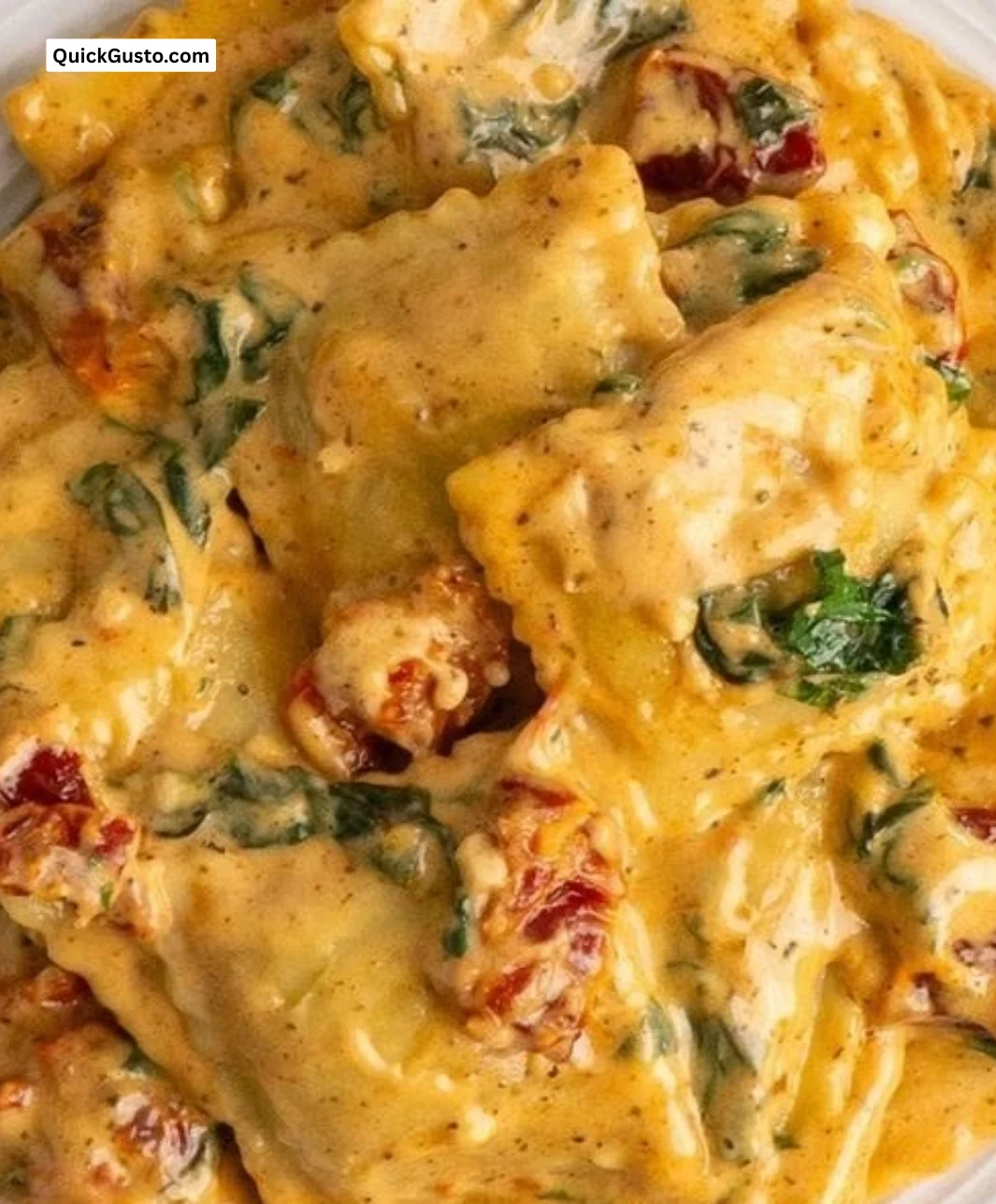 Delicious creamy Tuscan ravioli served with fresh herbs and Parmesan cheese