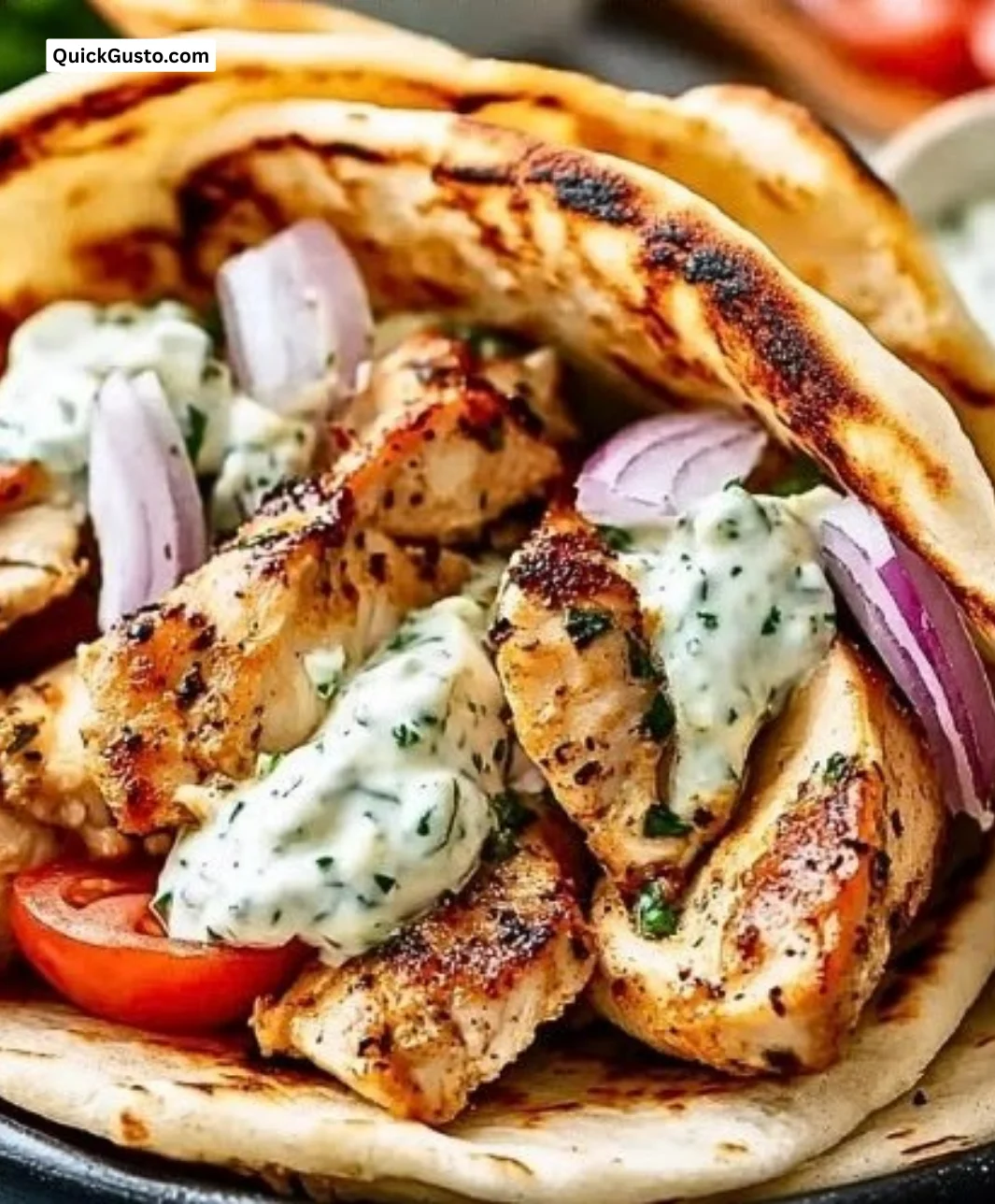 Delicious Easy Greek Chicken Gyros served with fresh toppings and sauce