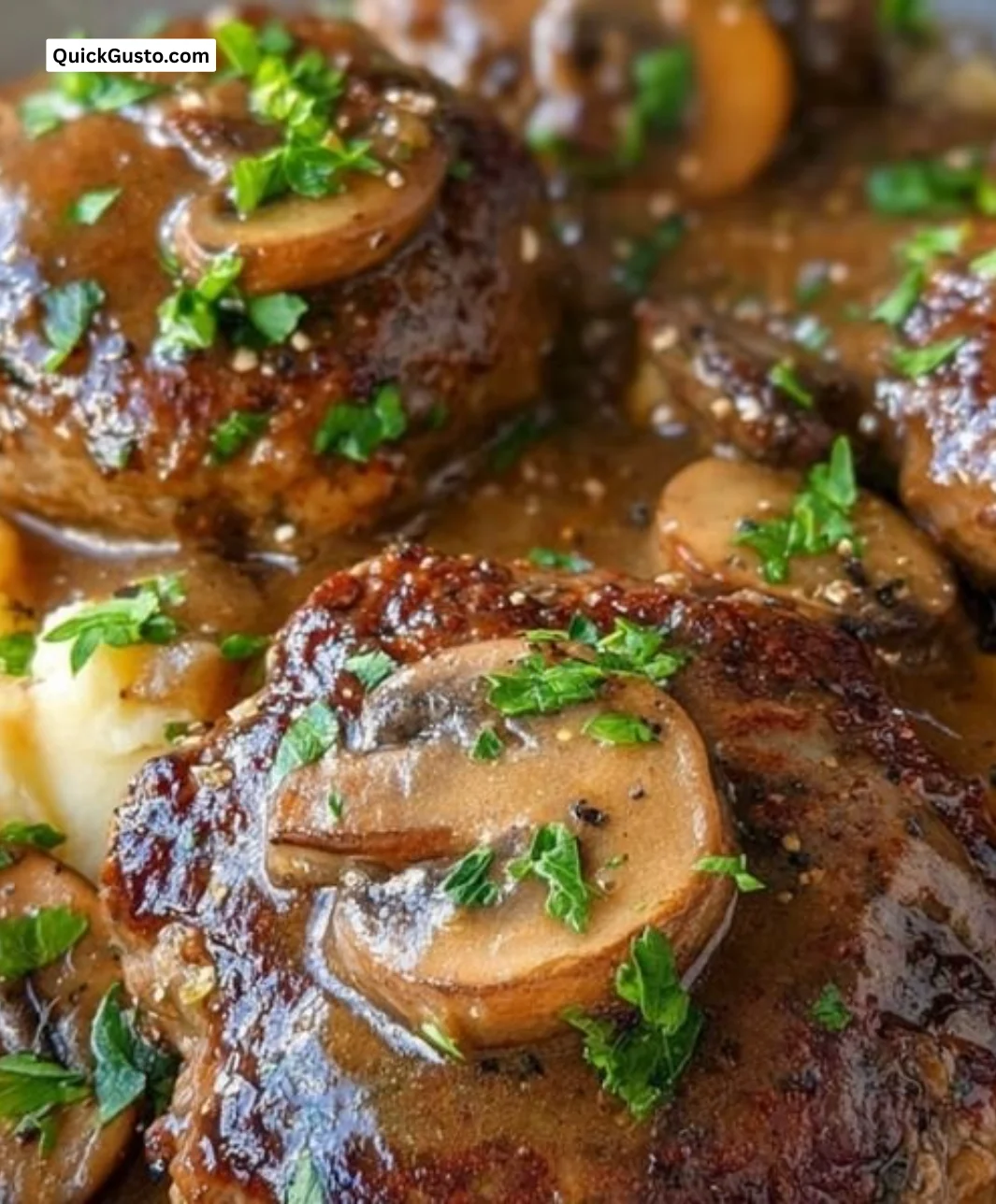 Easy homemade Salisbury steak served with mushroom gravy and mashed potatoes