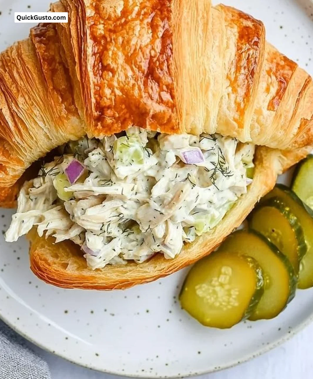 Flavored Dill Pickle Chicken Salad served in a bowl with garnish