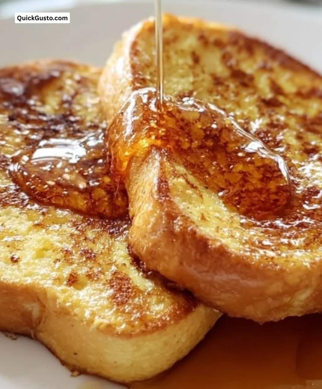 Deliciously prepared French toast topped with syrup and berries