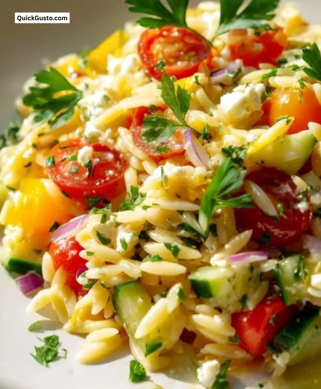 Fresh Mediterranean Orzo Pasta Salad with colorful vegetables and herbs