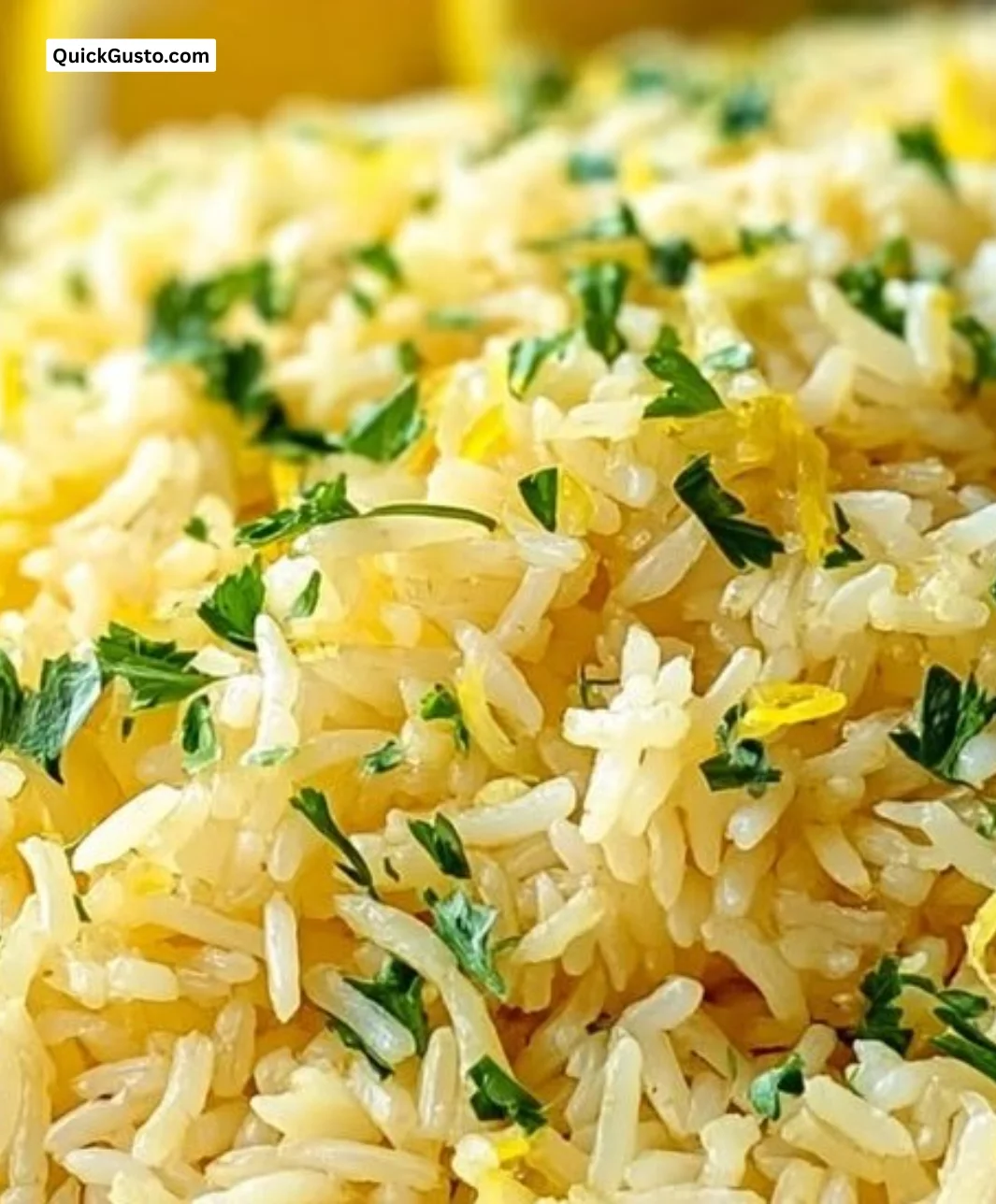 Delicious Greek lemon rice dish garnished with fresh herbs.