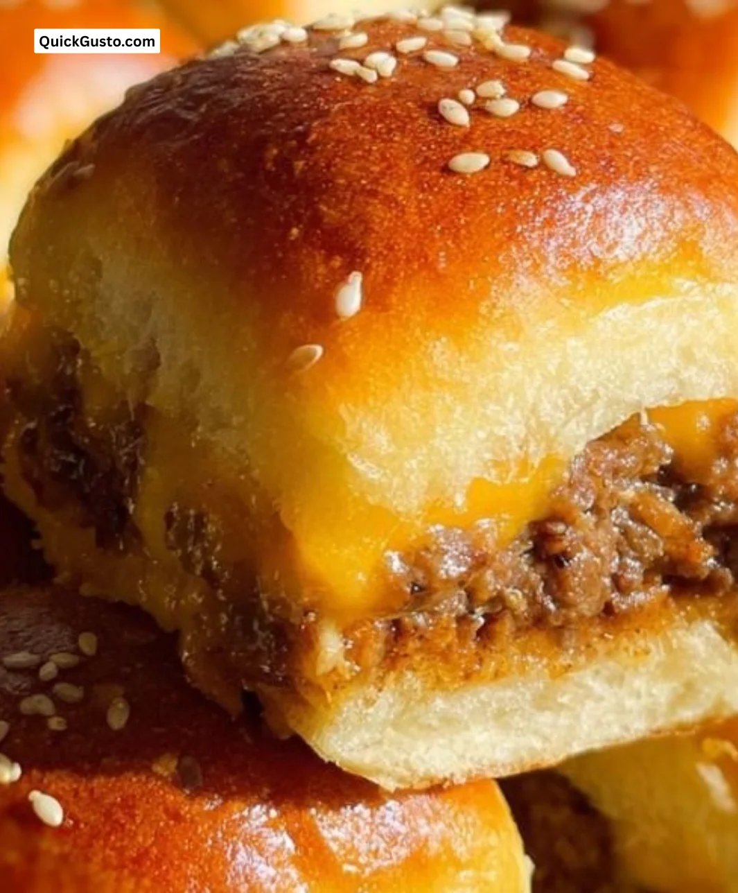 Juicy cheeseburger sliders served on a platter, ideal for parties and gatherings.