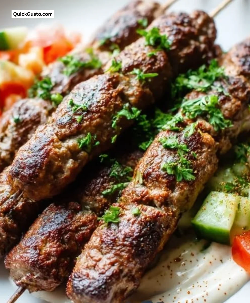 Grilled kofta kebabs skewers served with fresh herbs and spices