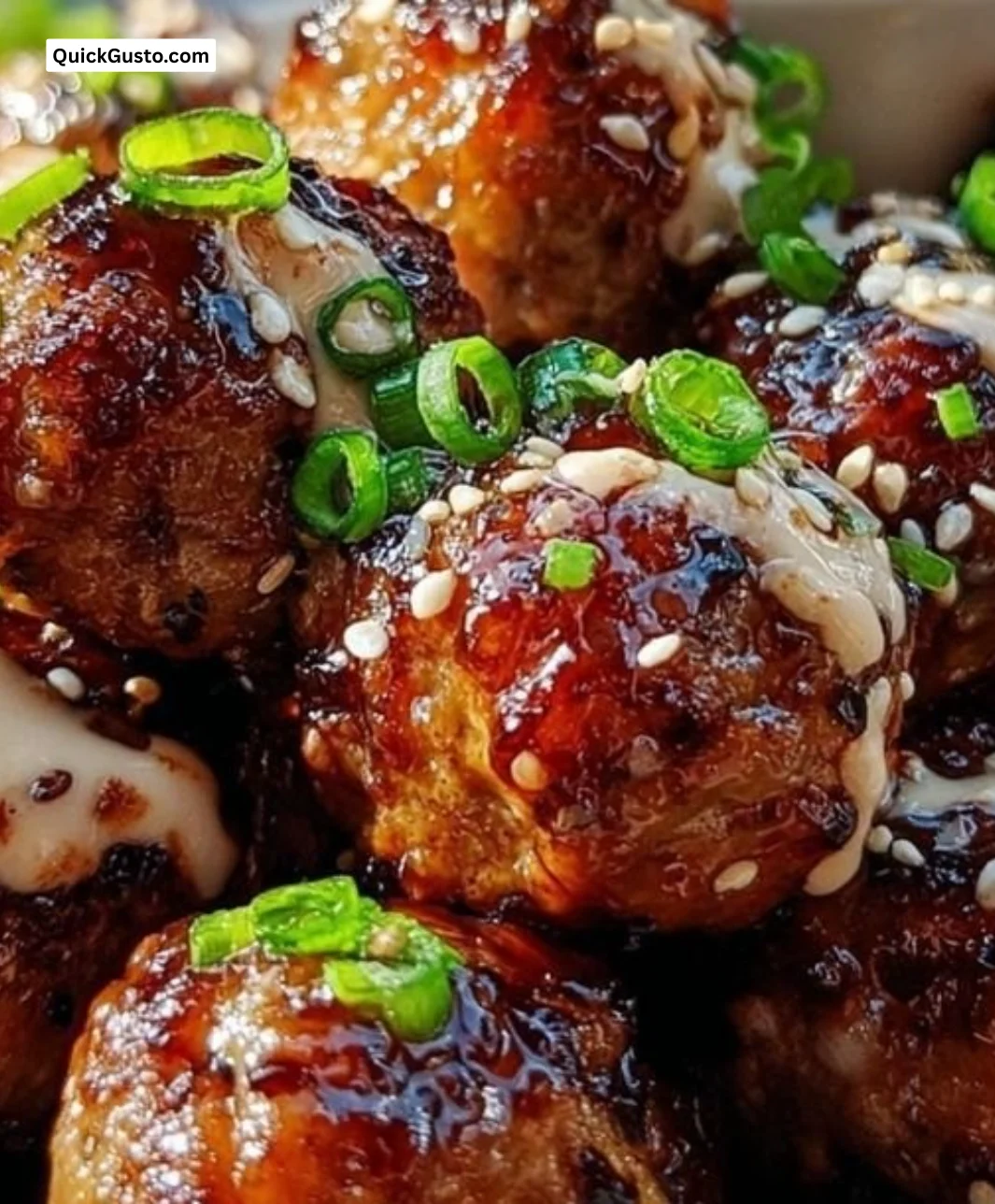 Korean BBQ meatballs served with spicy mayo dip on a plate