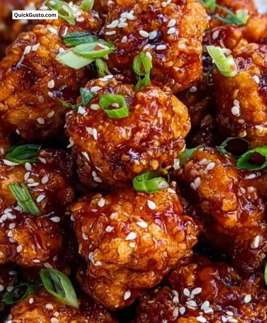 Crispy Korean Fried Chicken served with sauce and garnish