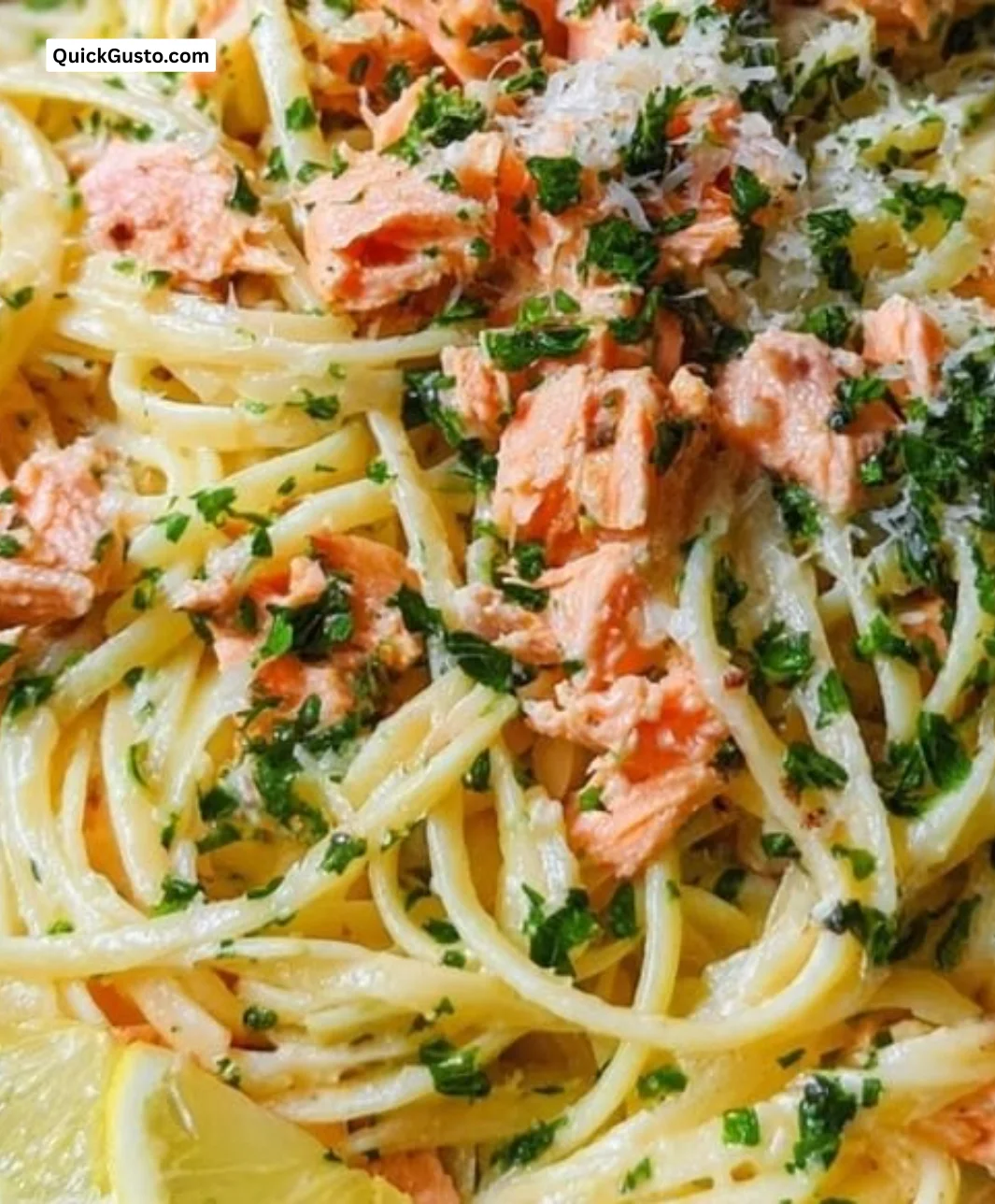 Delicious Lemon-Butter Salmon Pasta served in a bowl with fresh herbs