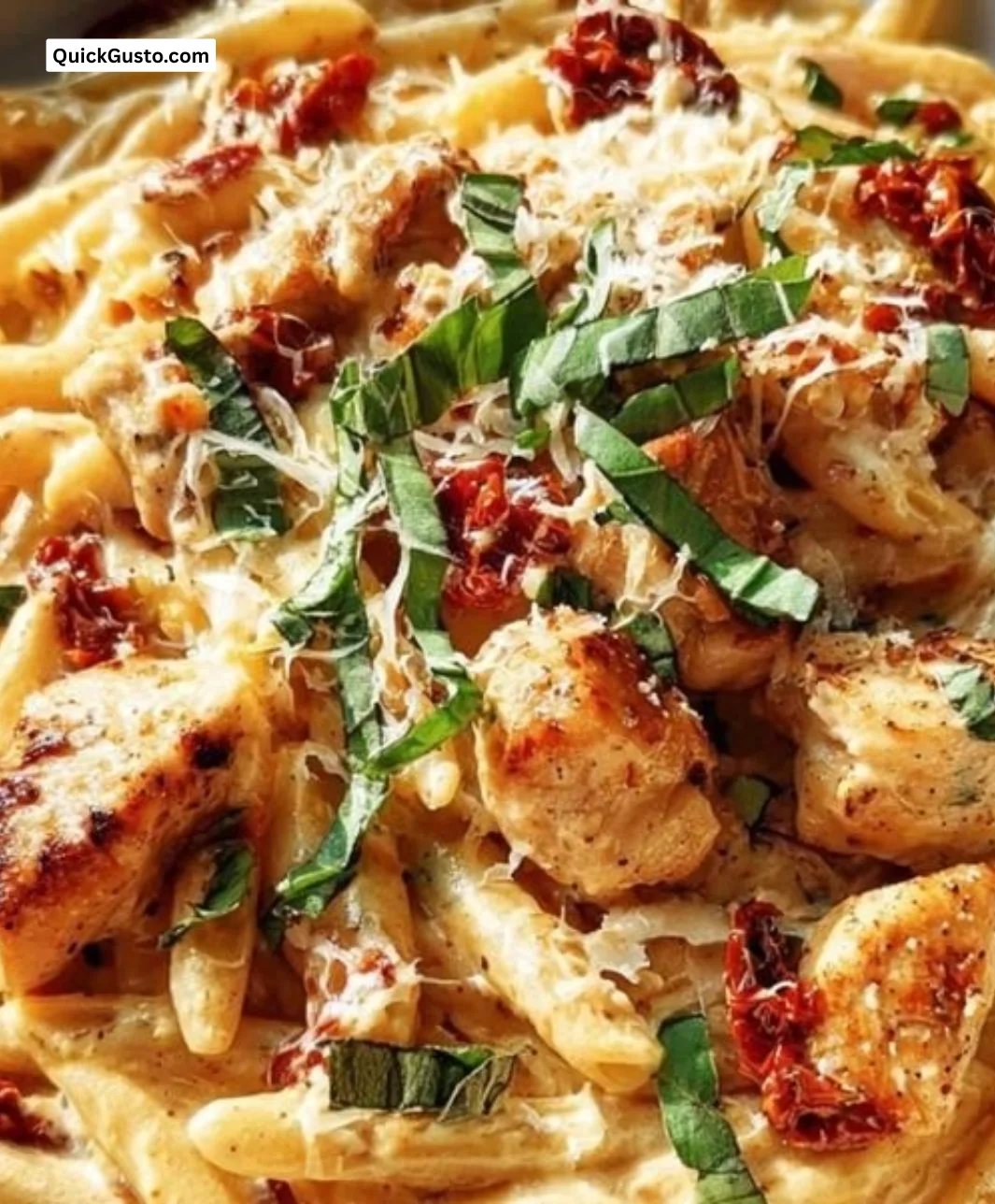 Creamy Marry Me Chicken Pasta served in a bowl with herbs and cheese