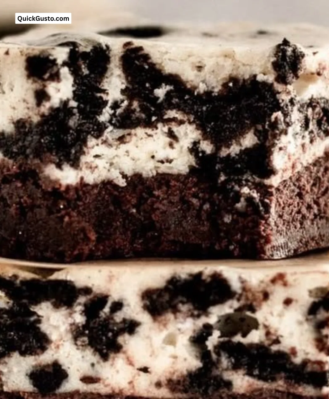 Delicious Oreo cheesecake brownies with a creamy and swirled cookie topping