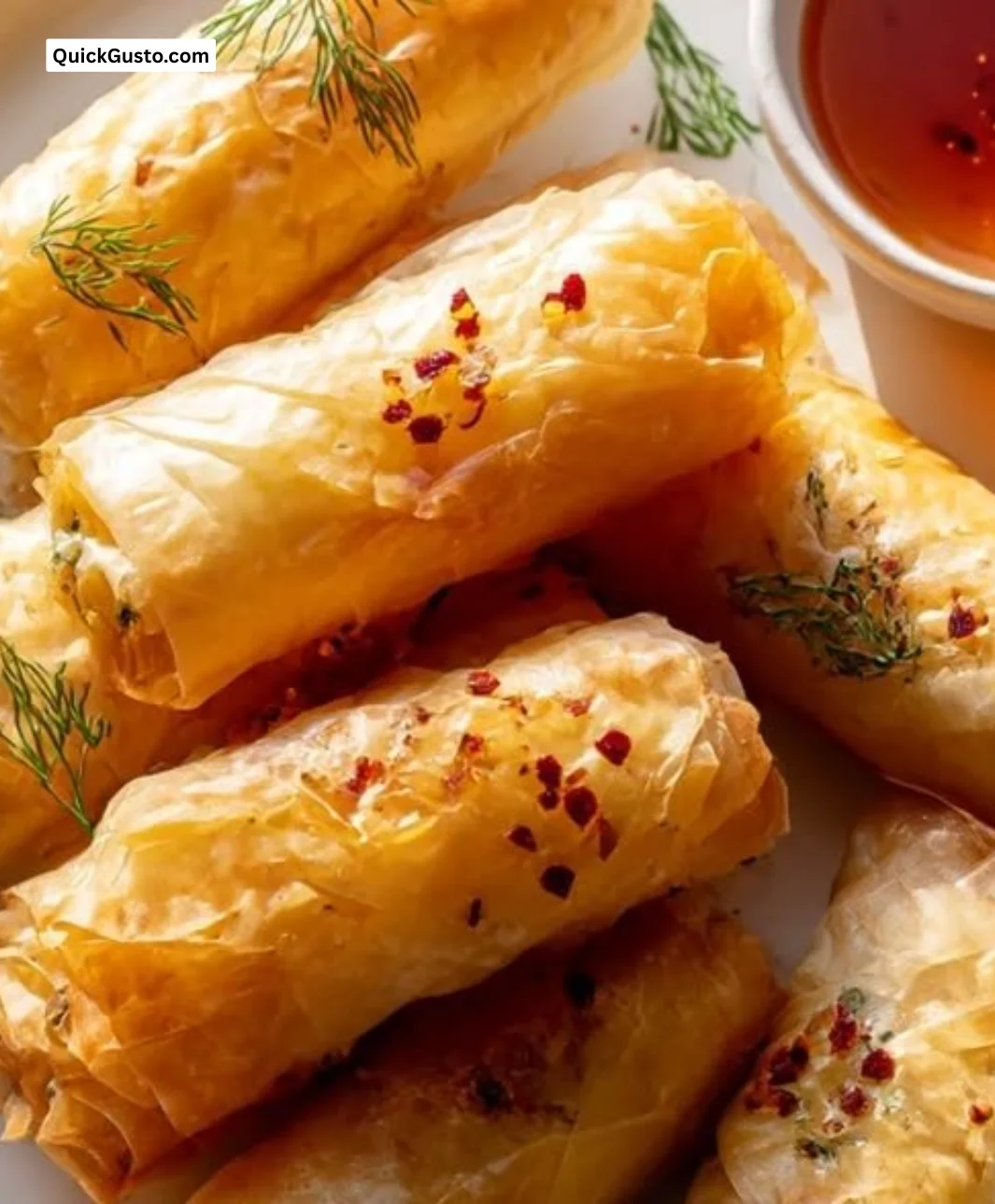 Crispy Oven Fried Feta Rolls drizzled with chili honey