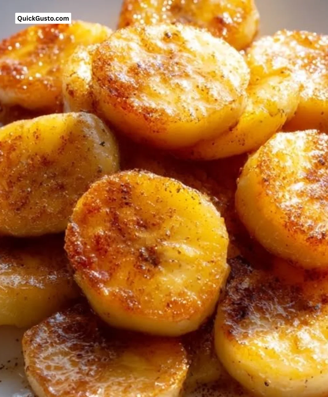 Delicious pan fried cinnamon bananas served as a warm dessert.