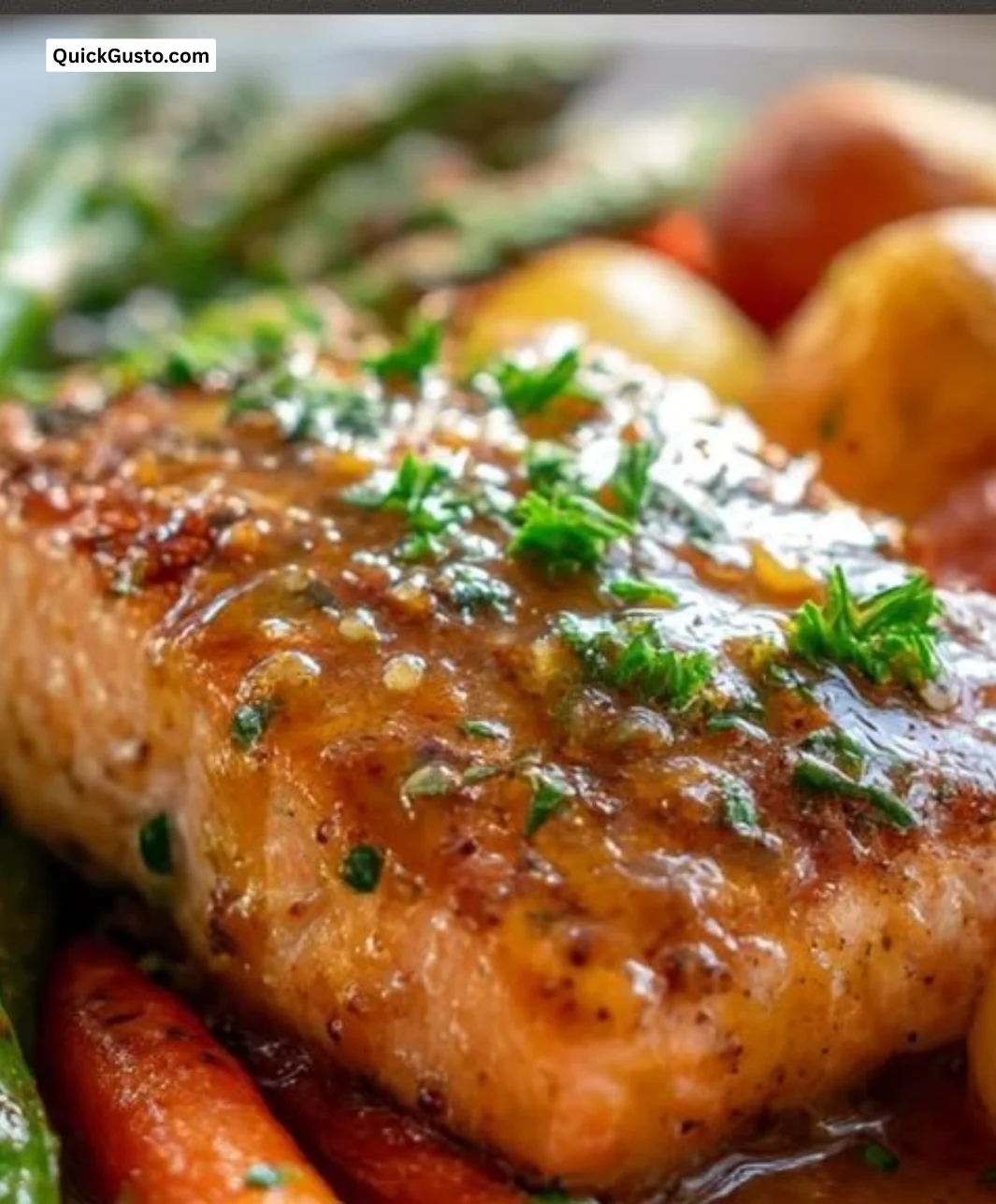 Maple Dijon salmon on a sheet pan with vegetables for a quick dinner.
