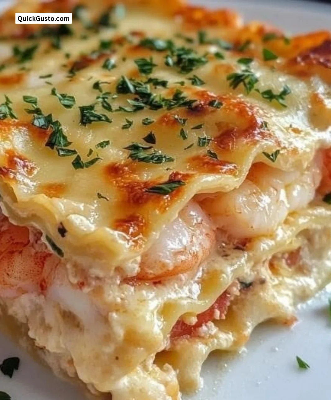 Delicious seafood lasagna with shrimp and lobster in a creamy sauce