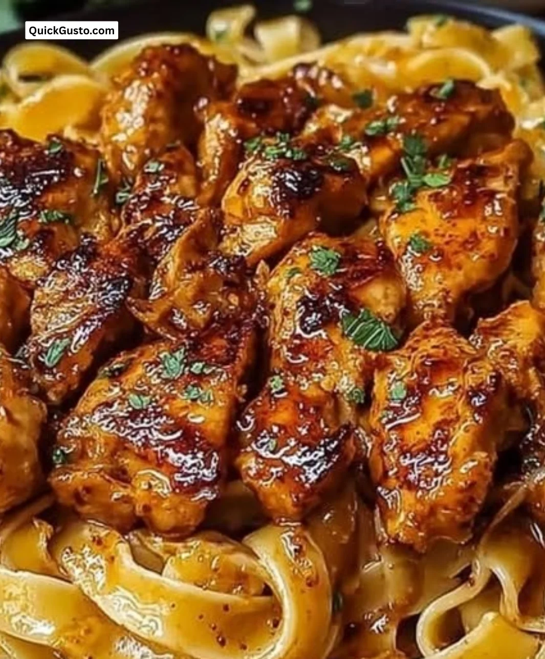 Delicious spicy Cajun honey butter chicken pasta served in a bowl