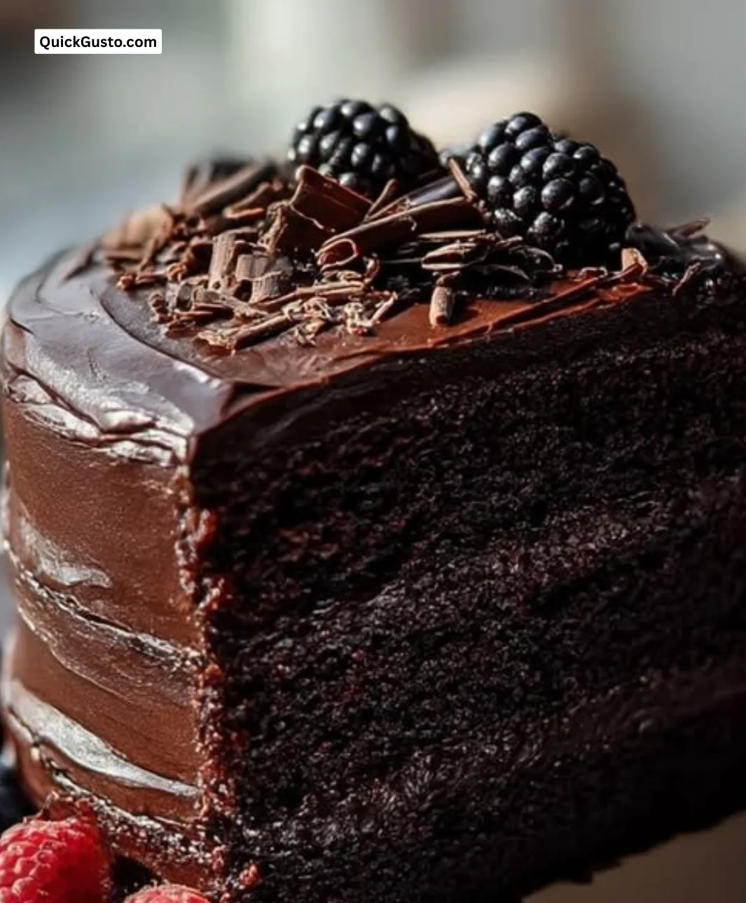 Delicious black velvet cake served on a rustic table under moonlight