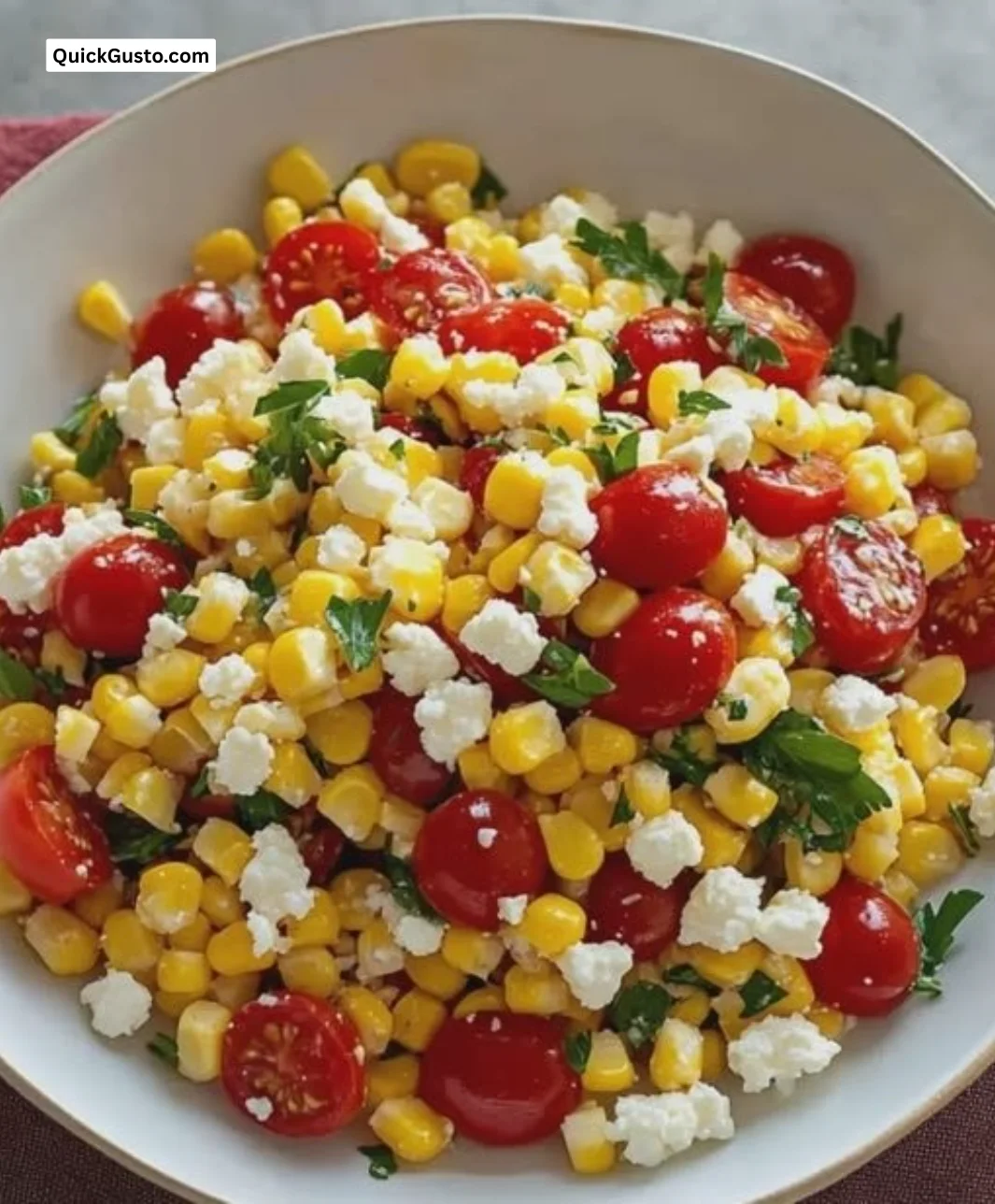 Delicious Corn Tomato Feta Salad with fresh ingredients in a bowl