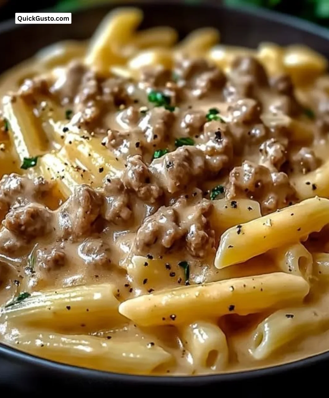 Creamy high-protein beef pasta dish served with herbs