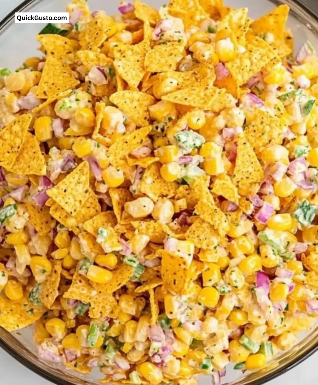 Bowl of crunchy Fritos corn salad with fresh vegetables
