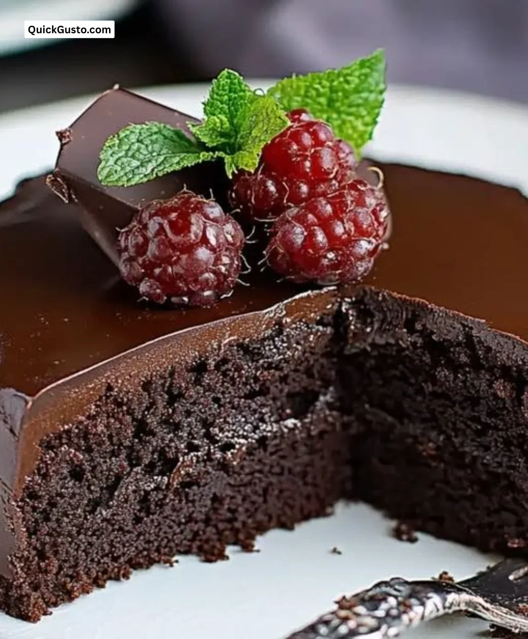 Delicious slice of Flourless Chocolate Cake on a elegant plate