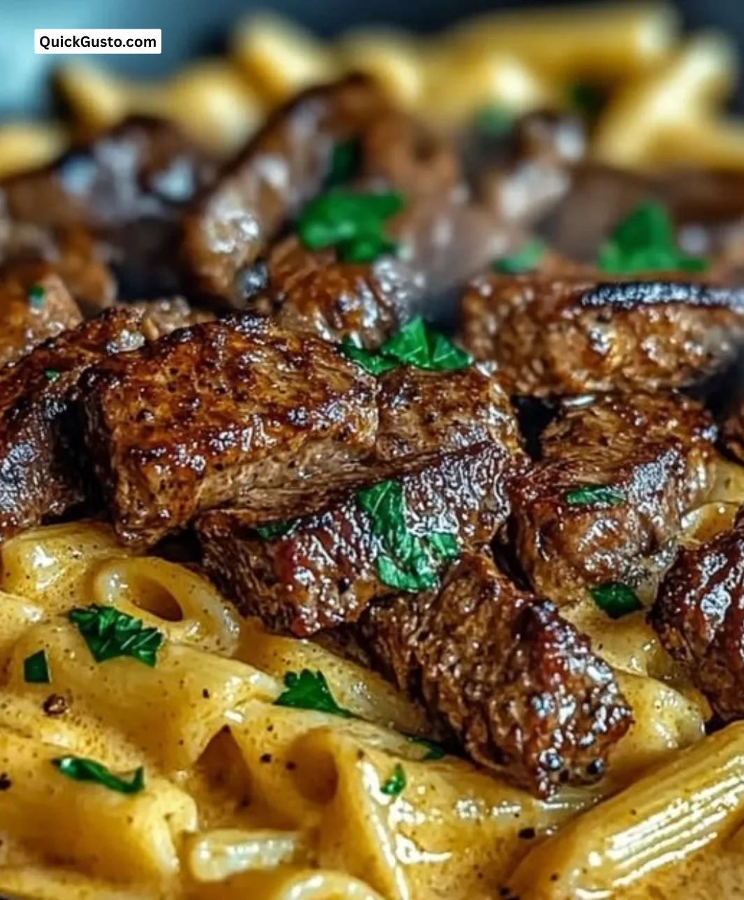 Cajun Butter Steak Pasta in a skillet, creamy and indulgent comfort food.