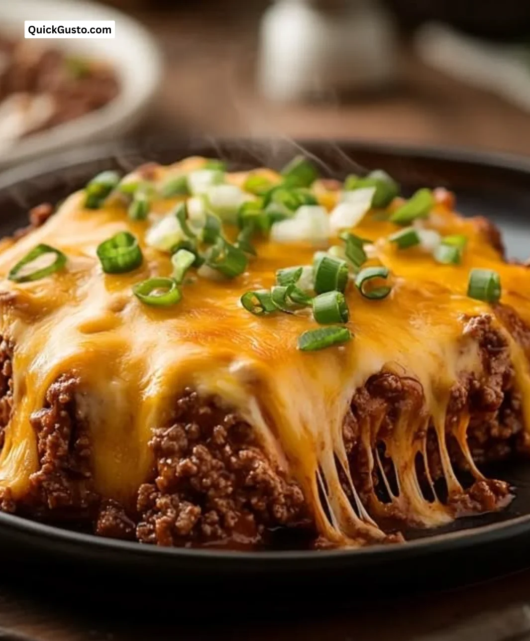 Delicious Keto Taco Bake topped with cheese and ground beef, perfect for dinner.