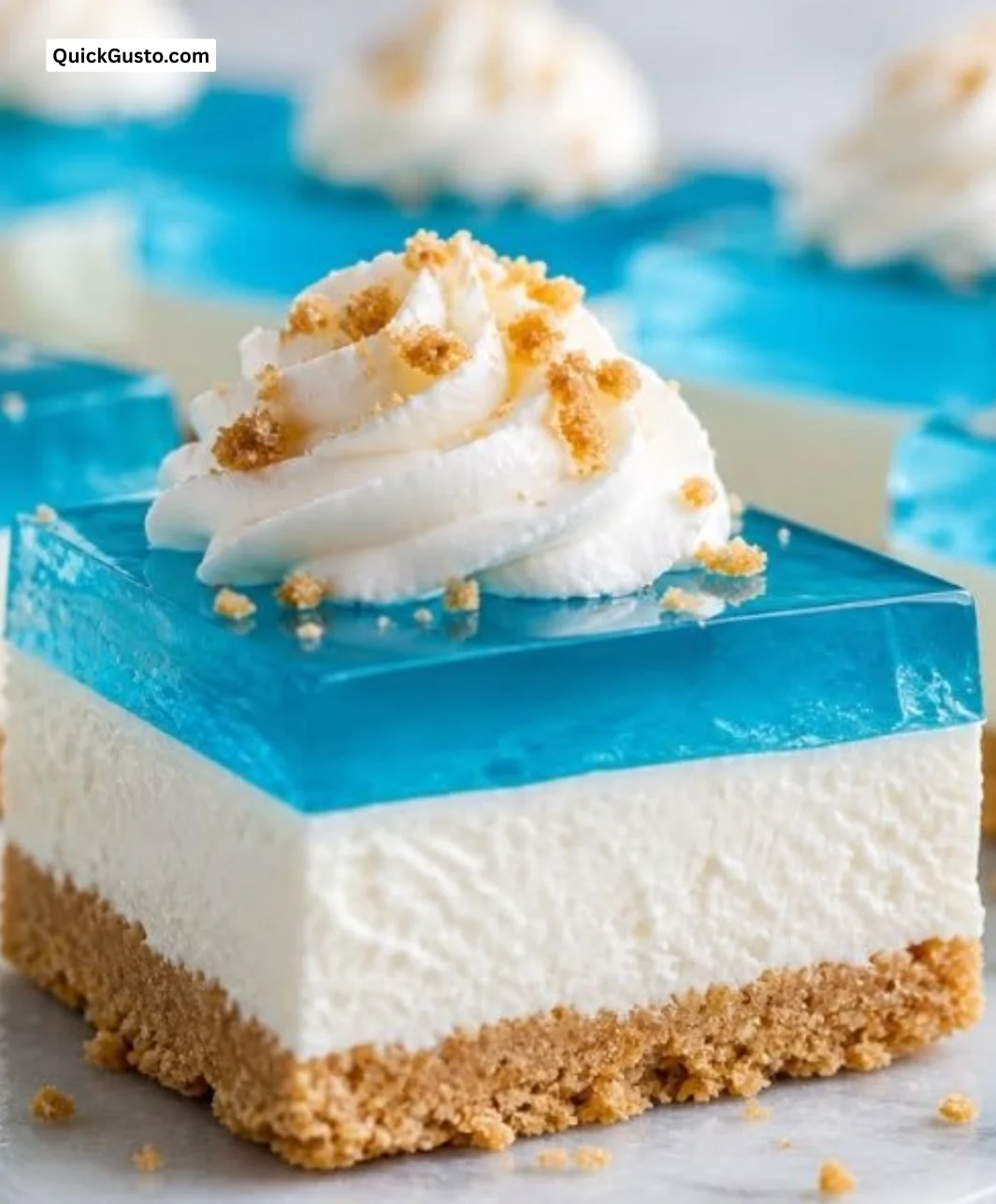 Vibrant No-Bake Blue Raspberry Rice Krispies Treats Bark on a plate.