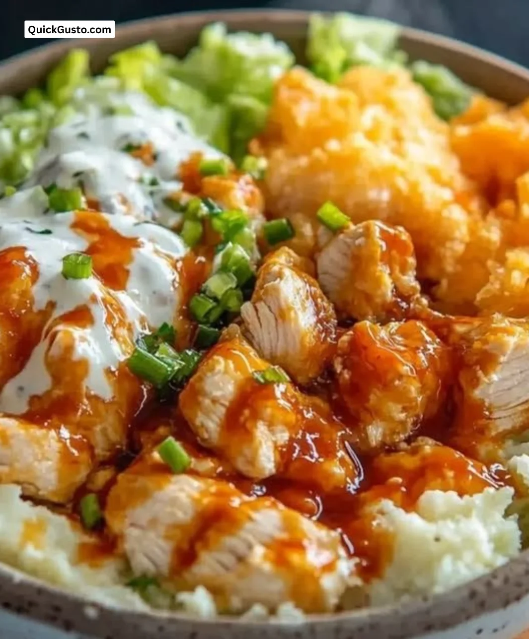 Delicious buffalo chicken protein bowl with fresh ingredients and vibrant colors