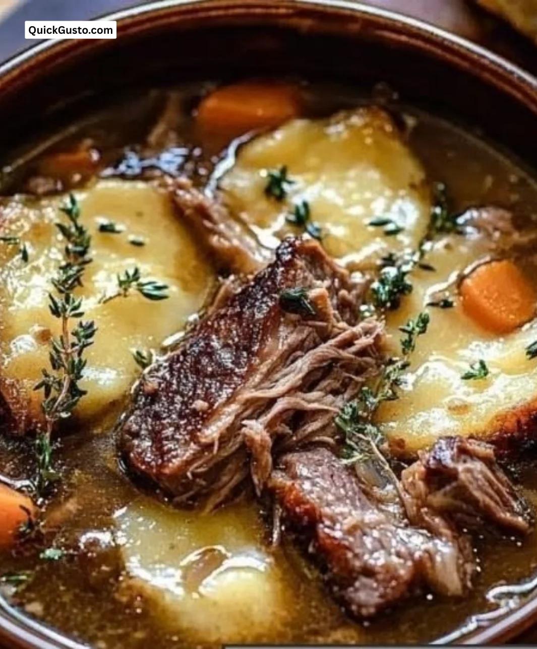Bowl of Savory French Onion Beef Short Rib Soup topped with melted cheese