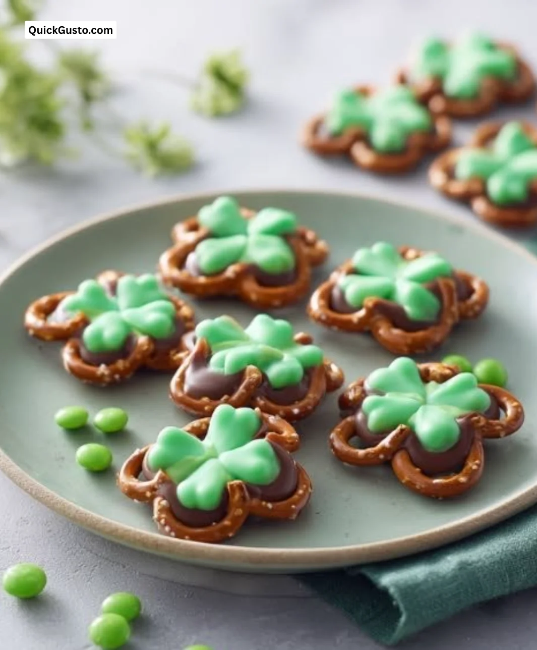 Delicious Shamrock Pretzel Pops decorated for St. Patrick's Day festivities