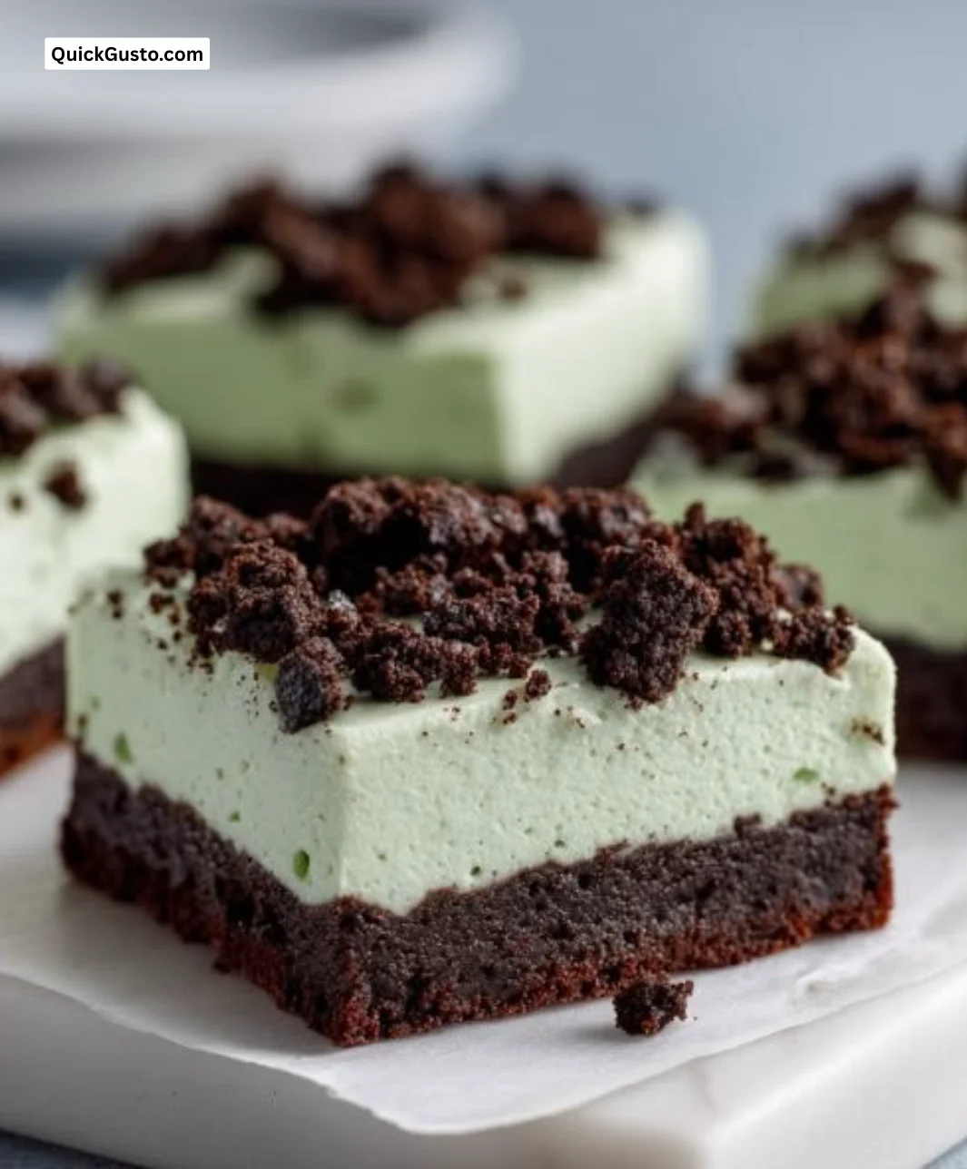 Triple layer fudgy mint Oreo brownies with chocolate and mint cream layers
