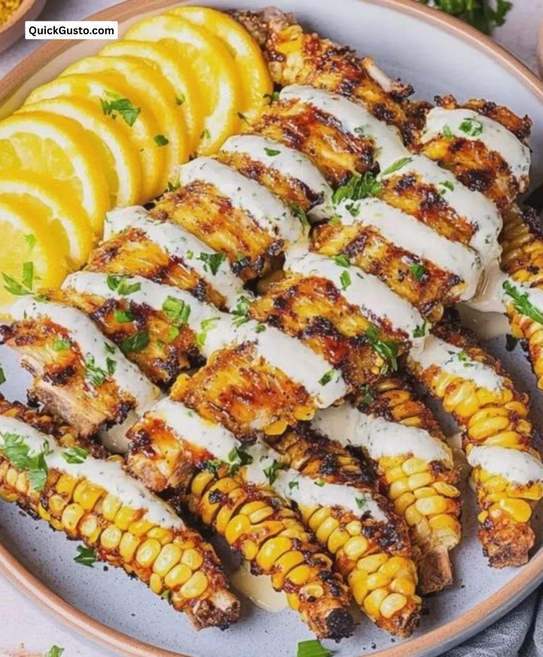 Delicious air fryer corn ribs served on a plate with seasonings