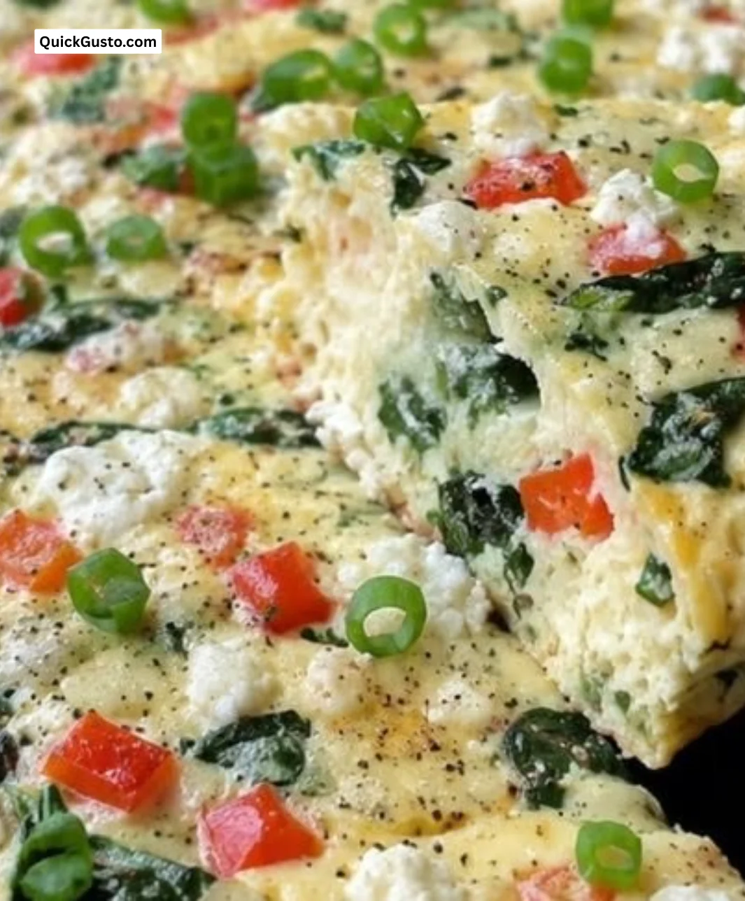 Delicious egg white frittata topped with vegetables and herbs