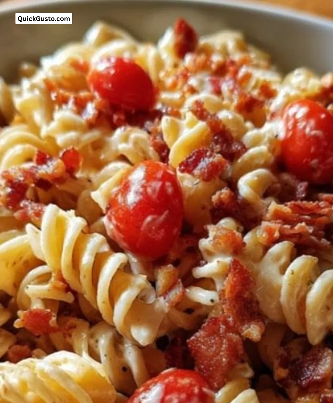 Delicious BLT Pasta Salad with bacon, lettuce, and tomato in a creamy dressing.