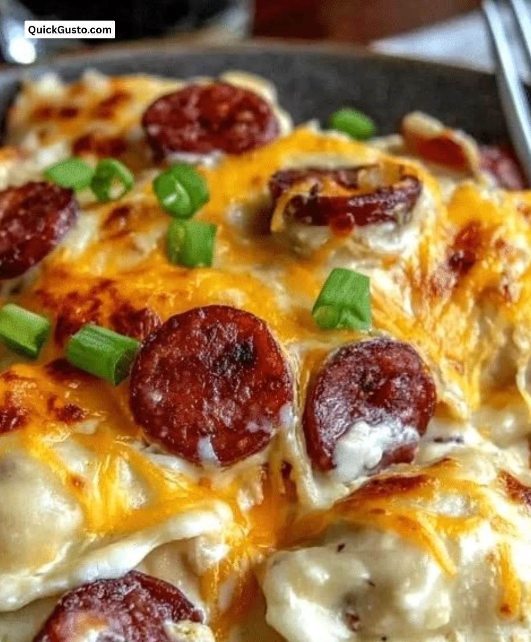 Cheesy Pierogi Casserole topped with melted cheese and herbs