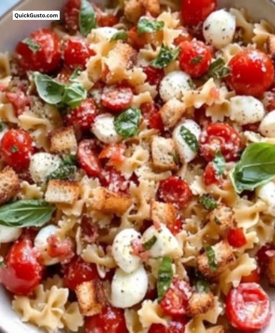 Delicious Cherry Tomato Bruschetta Pasta Salad garnished and ready to serve