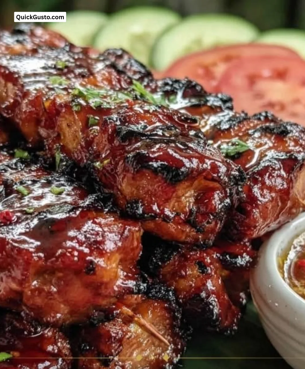 Delicious classic Filipino pork barbecue skewers on a grill