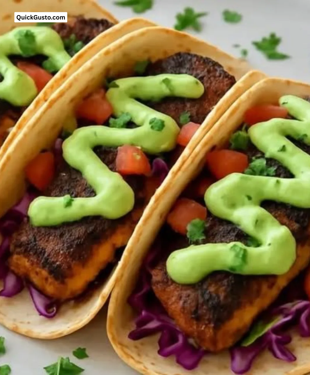 Cozy blackened fish tacos served with avocado cream sauce