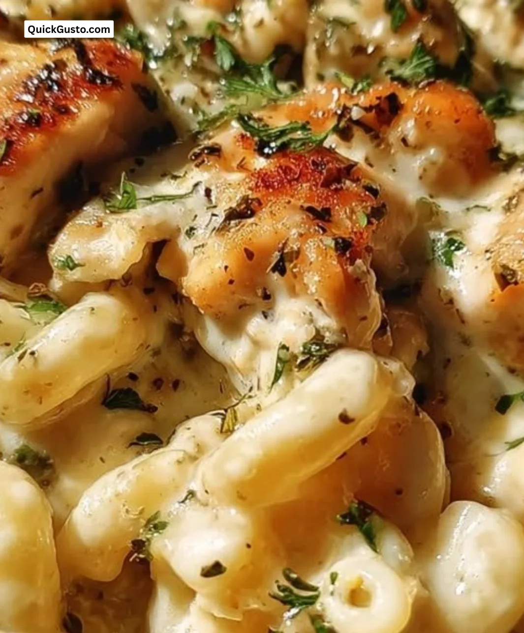 Creamy Garlic Herb Chicken Mac in a cozy serving bowl on a table