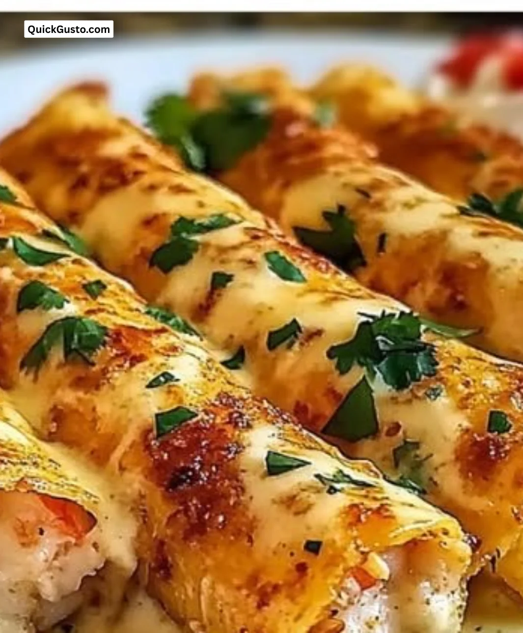 Crispy Crab and Shrimp Queso Taquitos on a plate, garnished and ready to enjoy.
