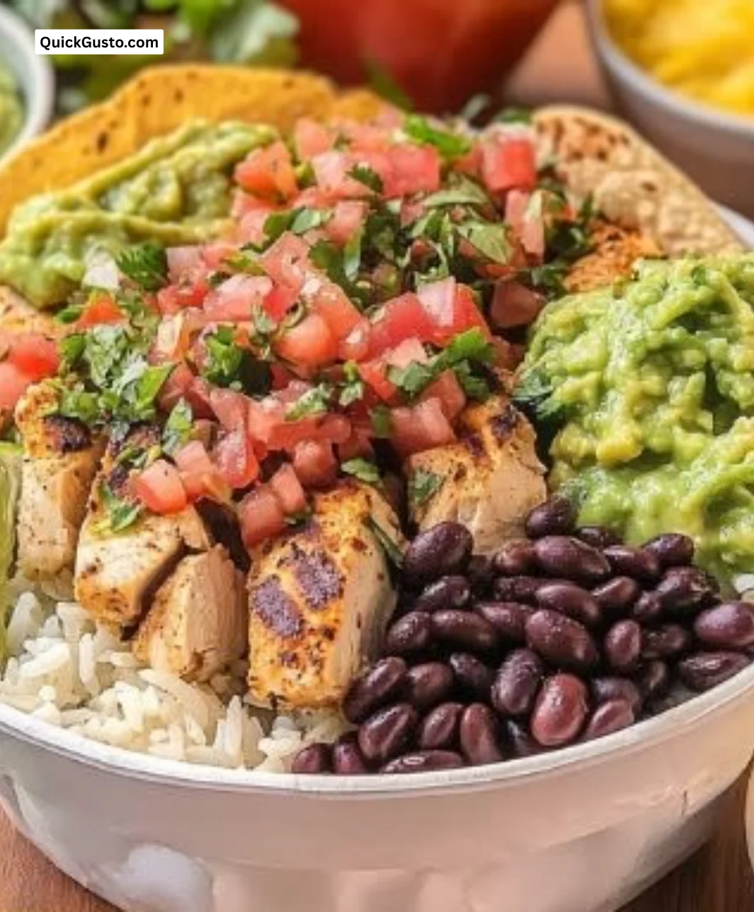 Homemade Chipotle Chicken Burrito Bowls with fresh ingredients and vibrant colors.