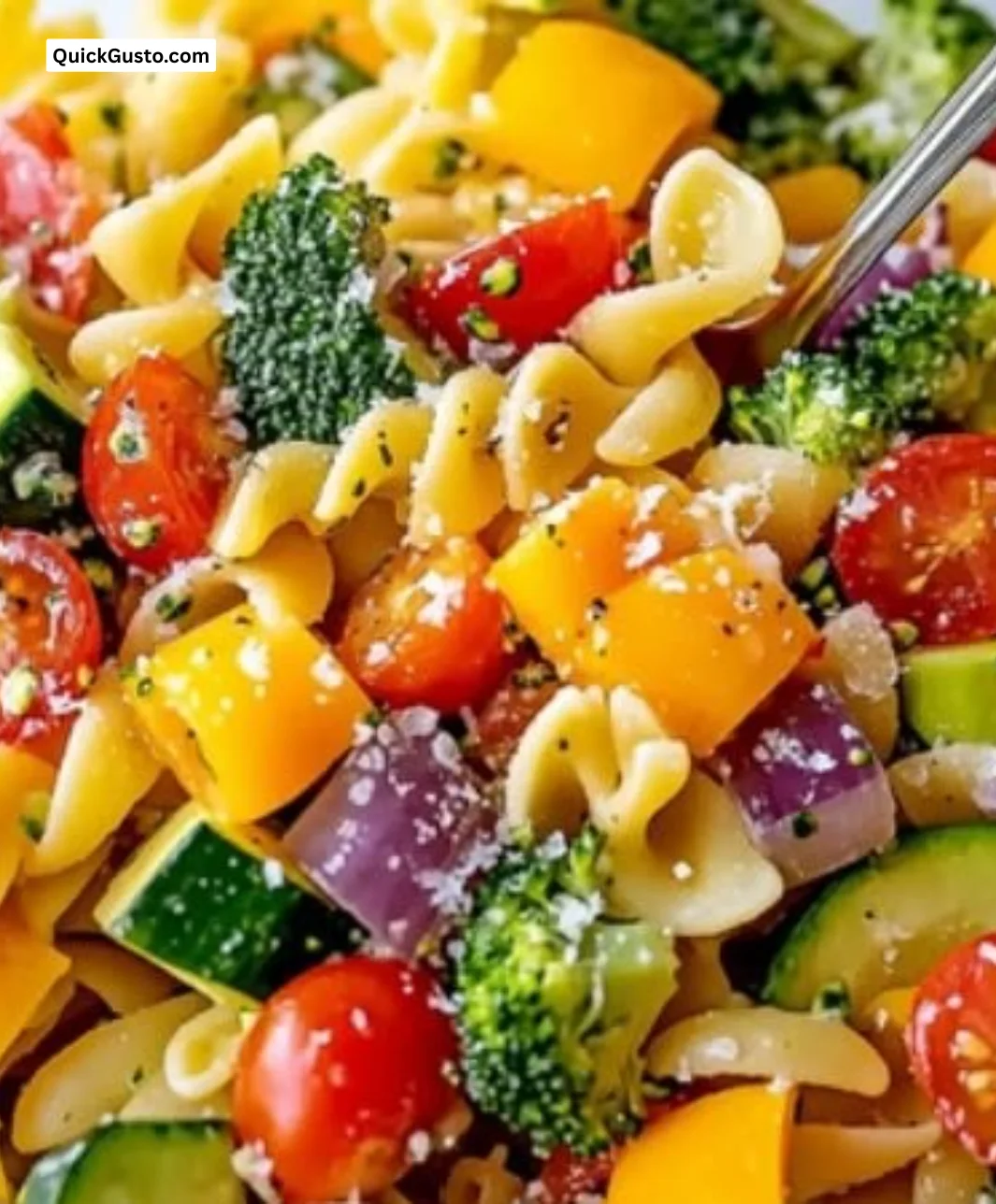 Colorful and fresh veggie pasta salad made with seasonal vegetables.