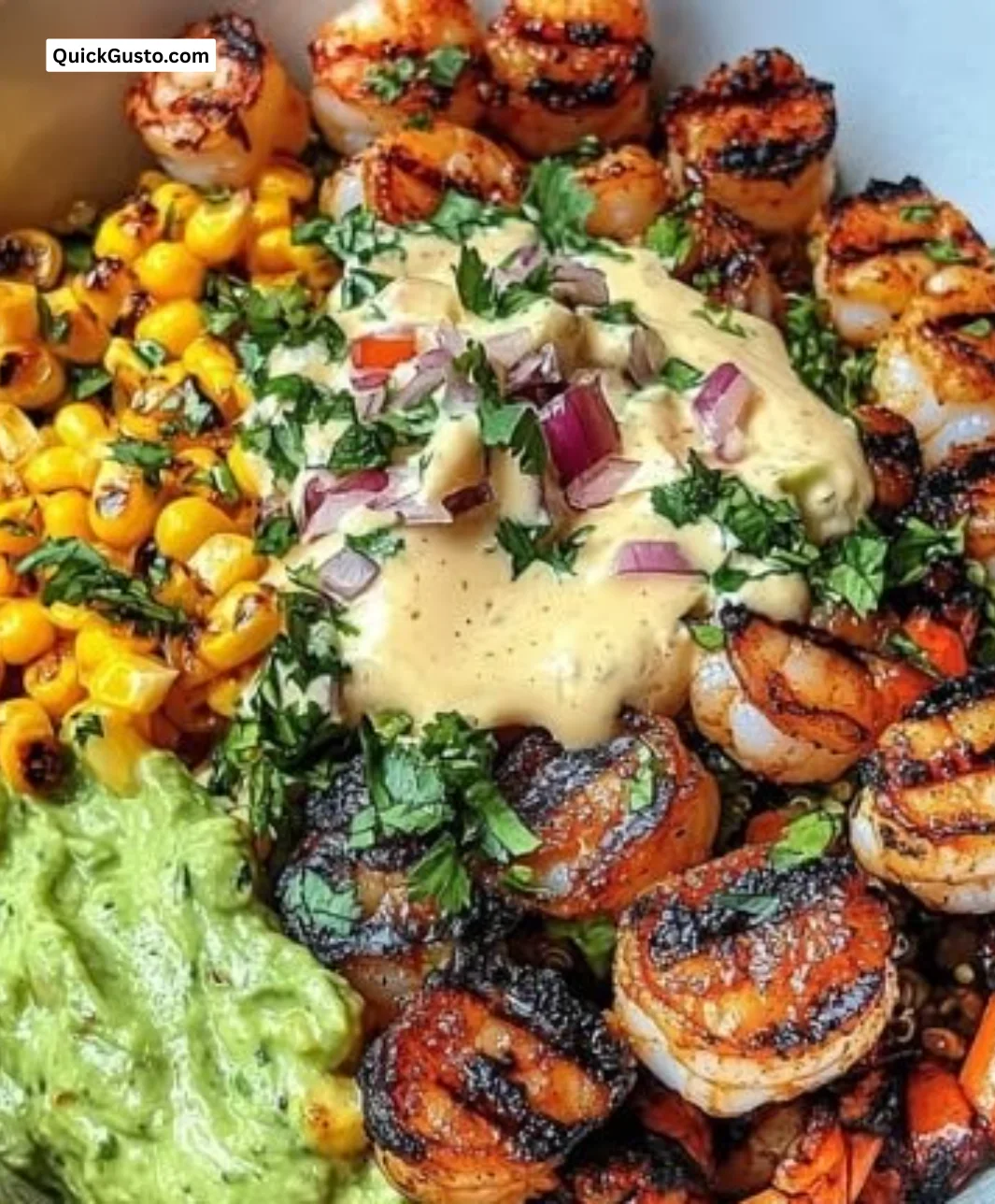 Healthy grilled shrimp bowl with avocado and corn salsa on a plate
