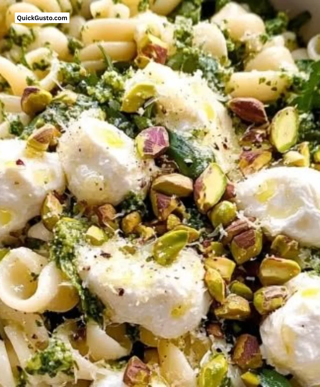 Lemon Burrata Pasta Salad with fresh herbs and vibrant ingredients in a bowl