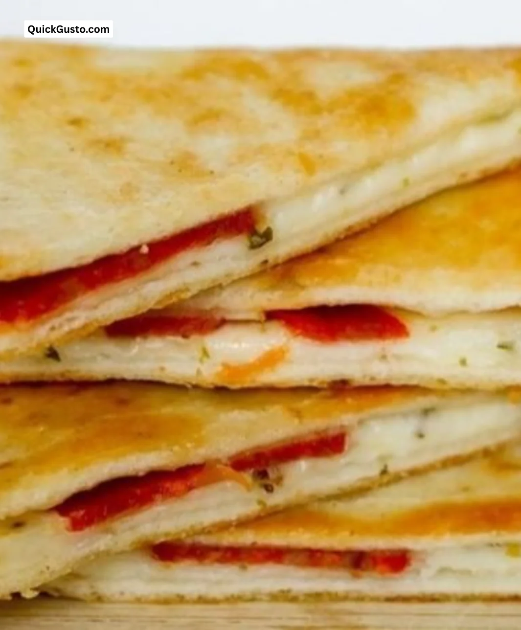 Delicious pepperoni pizzadillas served with dipping sauce.